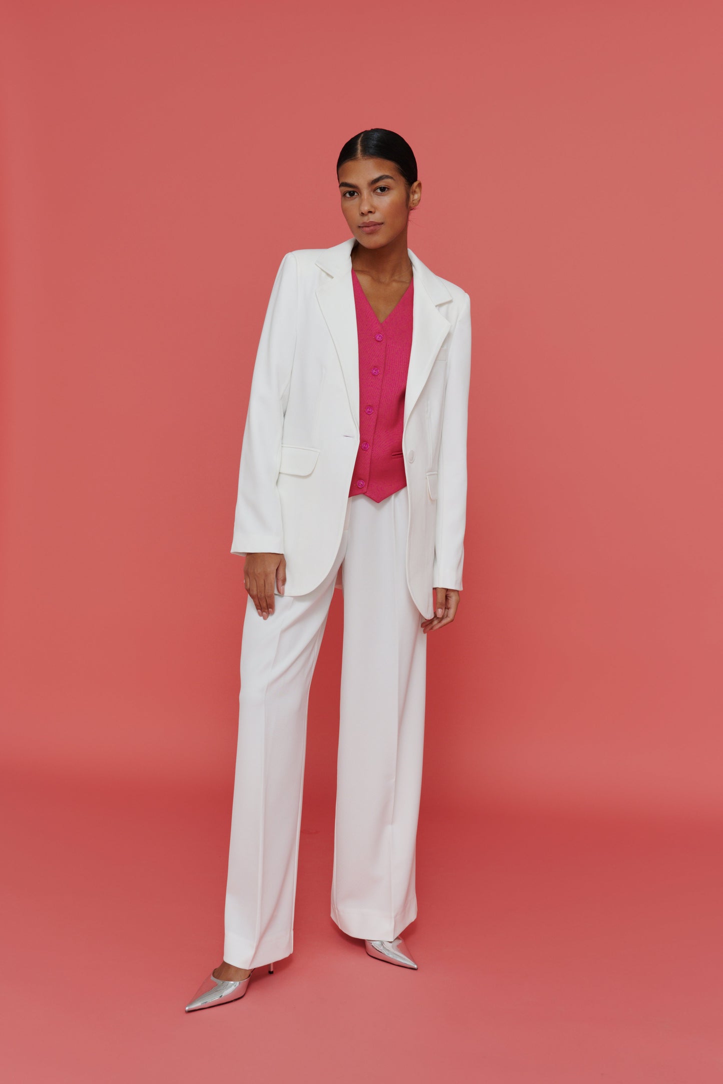 elegant outfit with white palazzo pants and vest