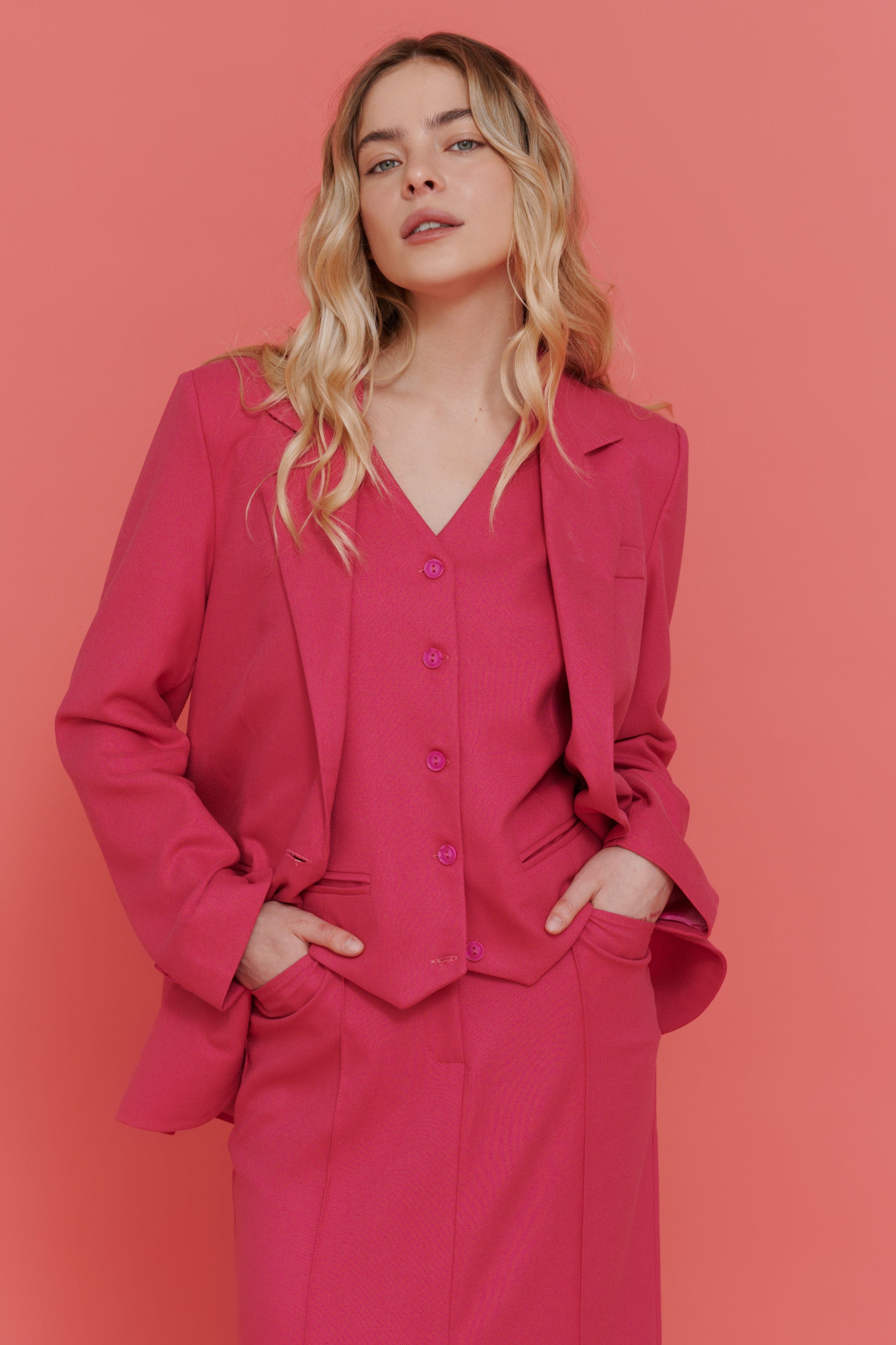 Pink Vest front view – V-neck button placket