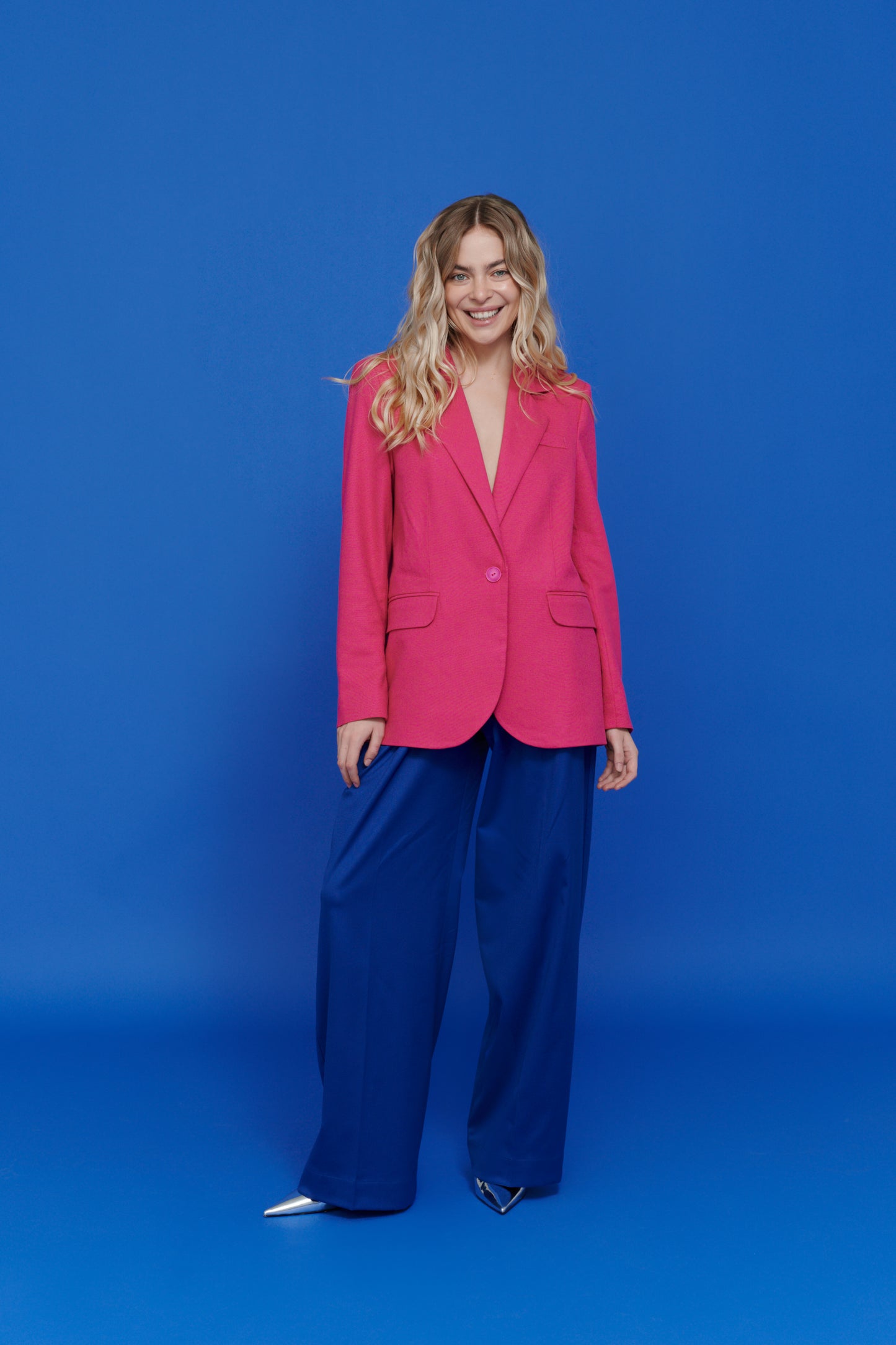 Electric Palazzo Pants with pink blazer – bold women’s suit