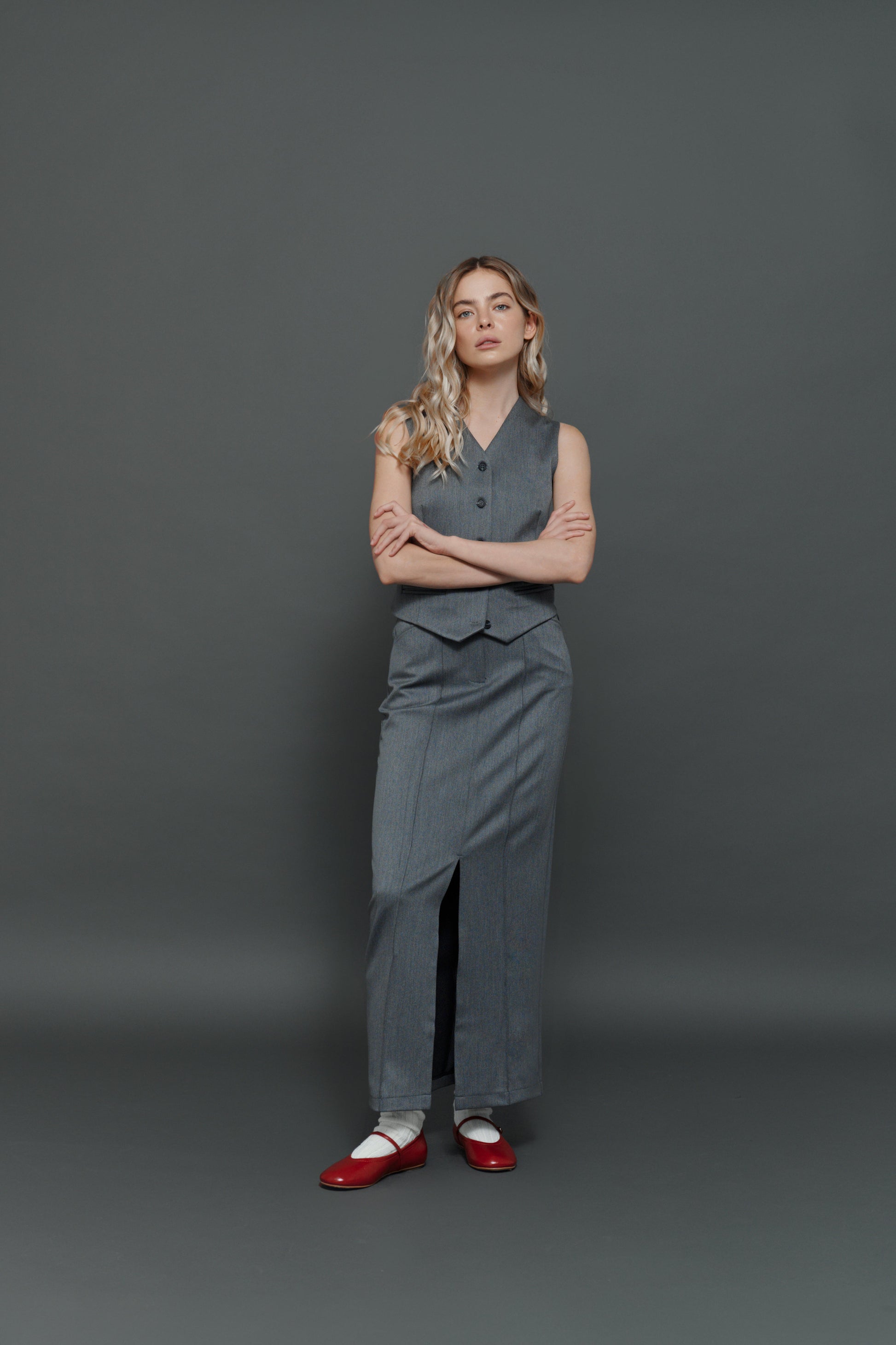 Close-up of gray skirt fabric and premium tailoring