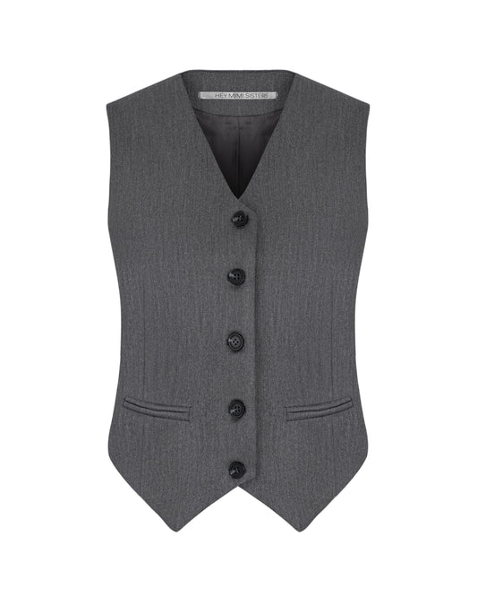 Front view of women’s gray vest, tailored suit design