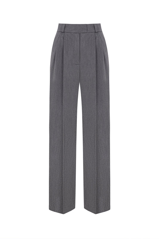 Model wearing gray palazzo pants with matching blazer.
