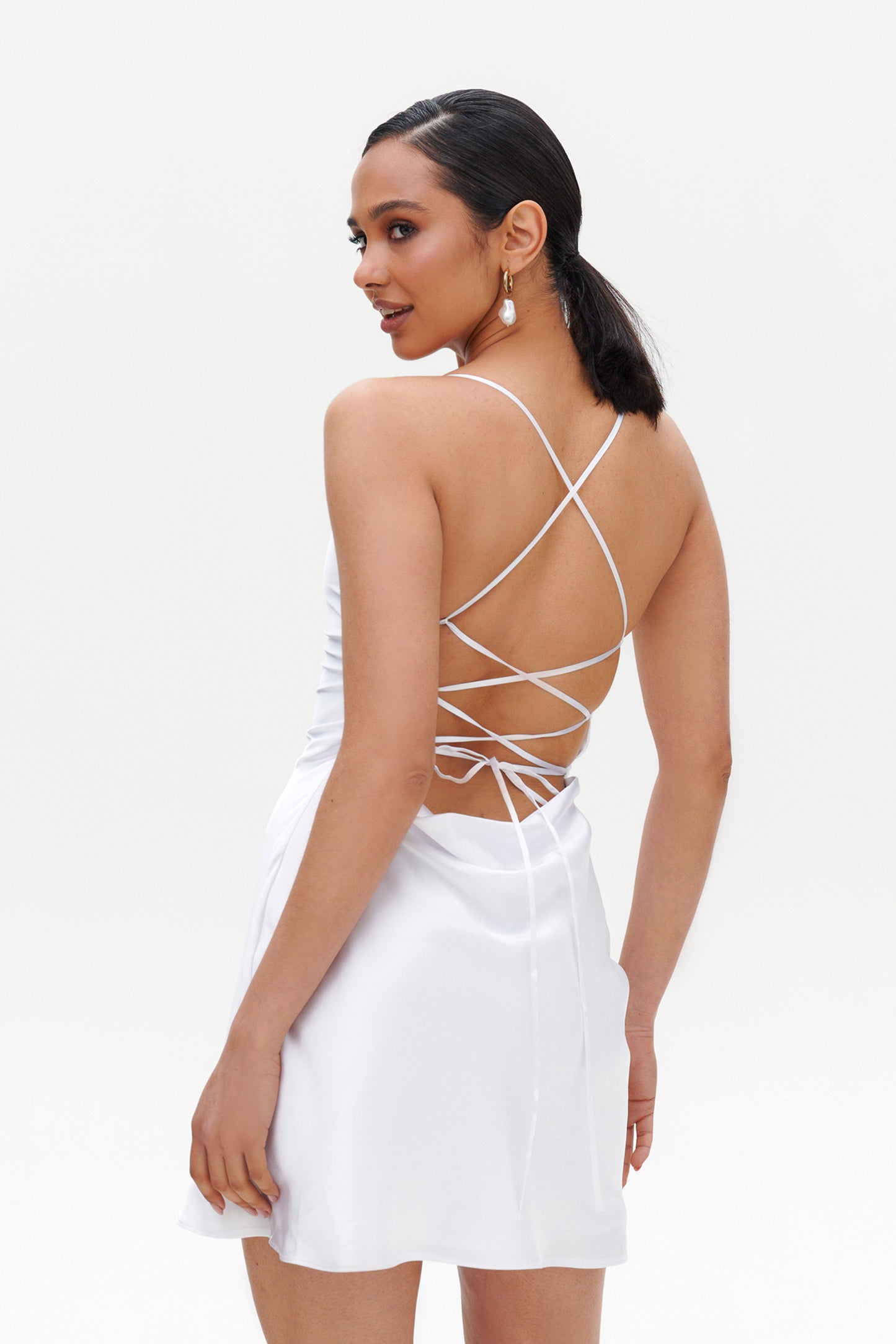 White Slip Mini Dress back view – satin short white dress with lace-up straps