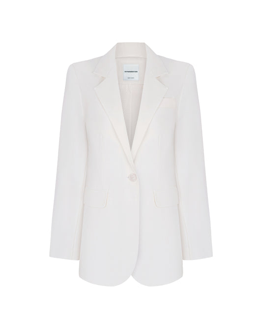 Front view of women’s oversized white blazer with notch lapels
