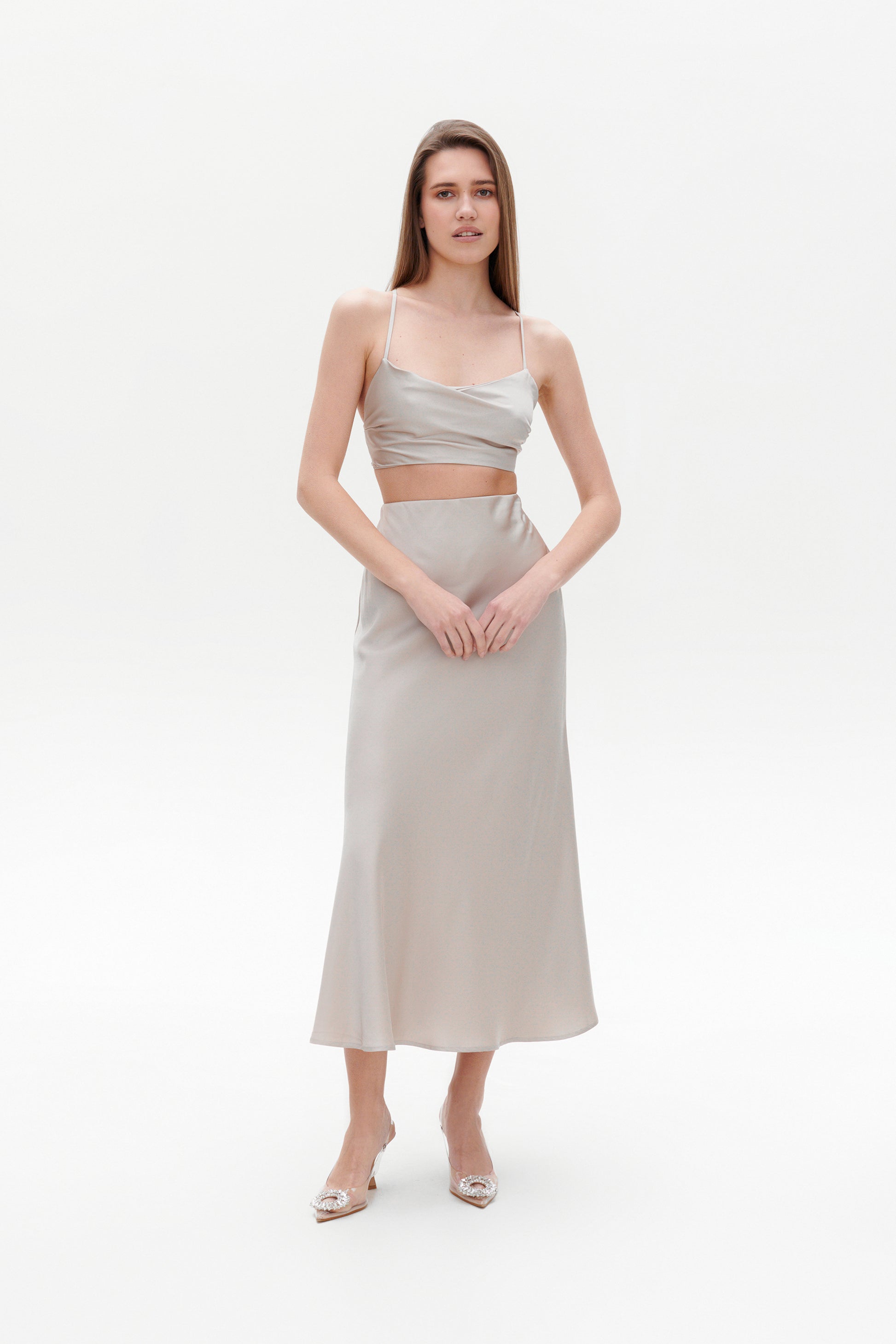 Beige satin skirt midi length side view