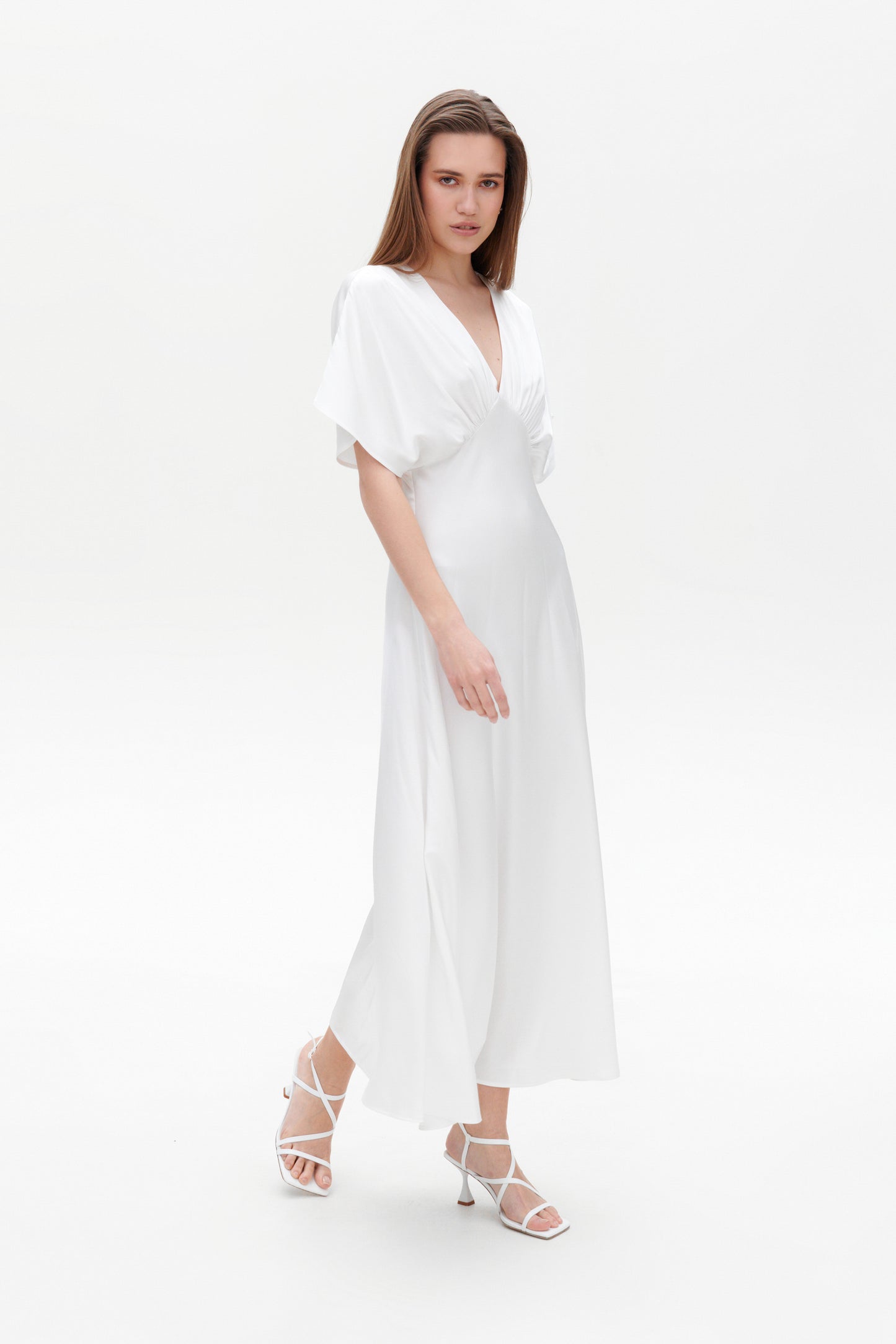 White Gretta Dress side view – slim fit satin maxi dress in white