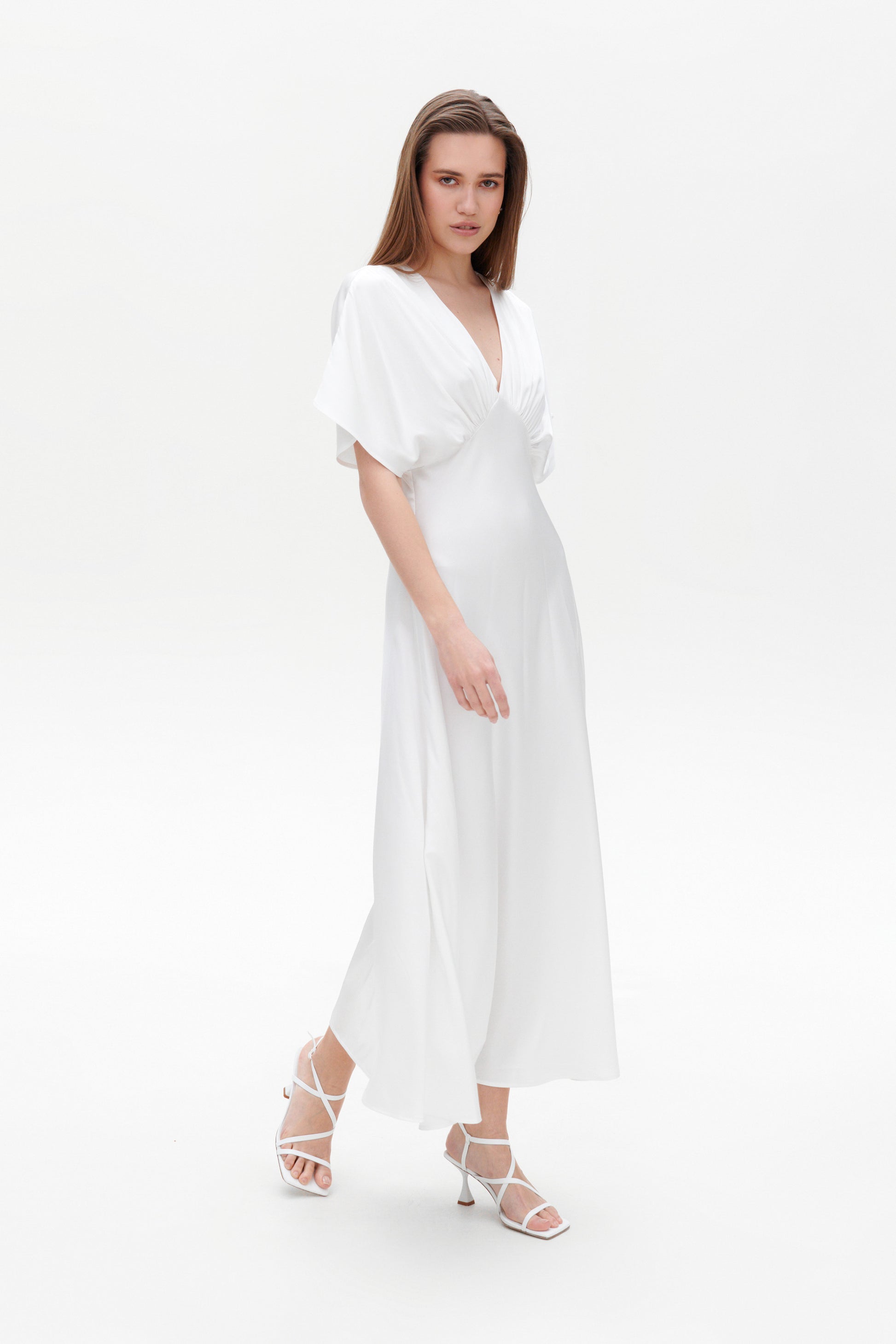 White Gretta Dress side view – slim fit satin maxi dress in white