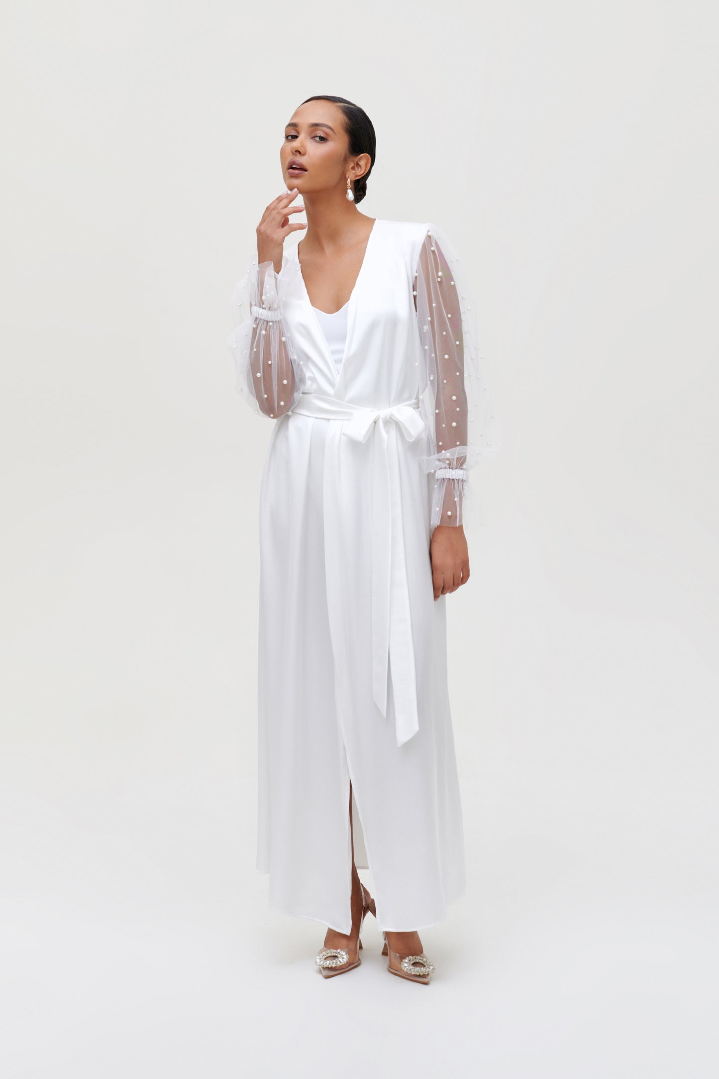 Elegant white bridal robe with pearl-adorned sleeves, perfect for bridal morning photoshoots.