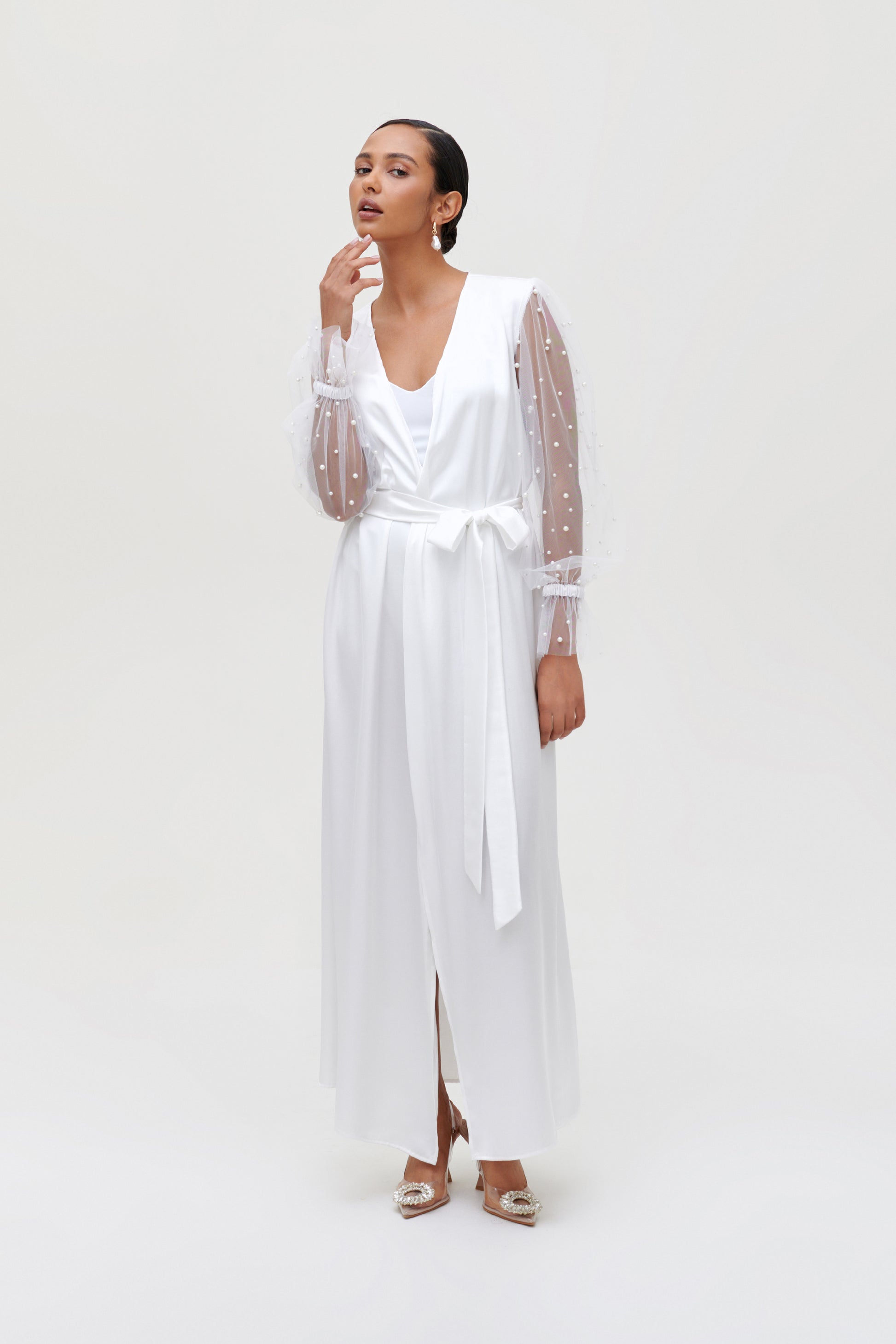 Elegant white bridal robe with pearl-adorned sleeves, perfect for bridal morning photoshoots.