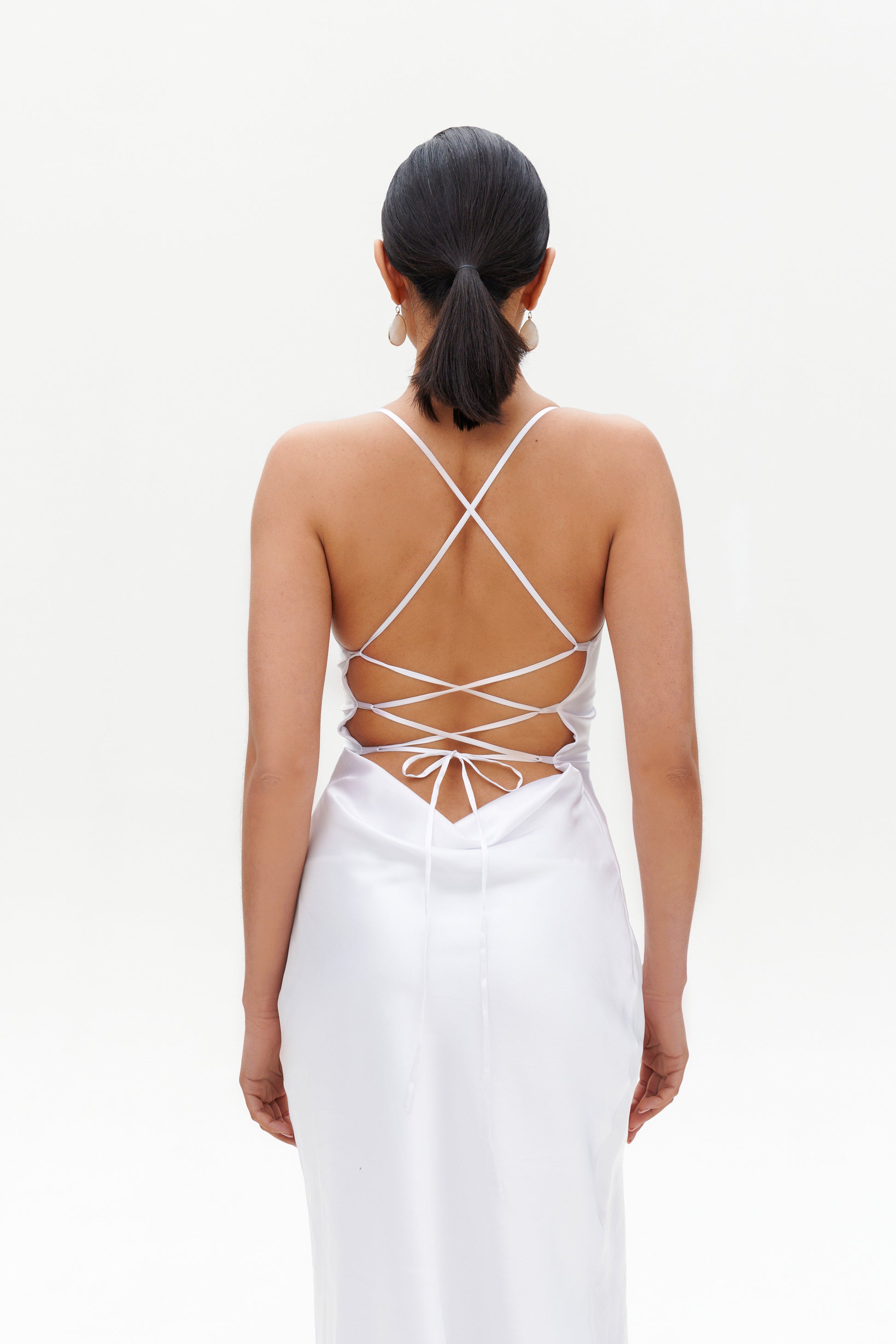 White Slip Midi Dress back view – satin white midi dress with lace-up straps