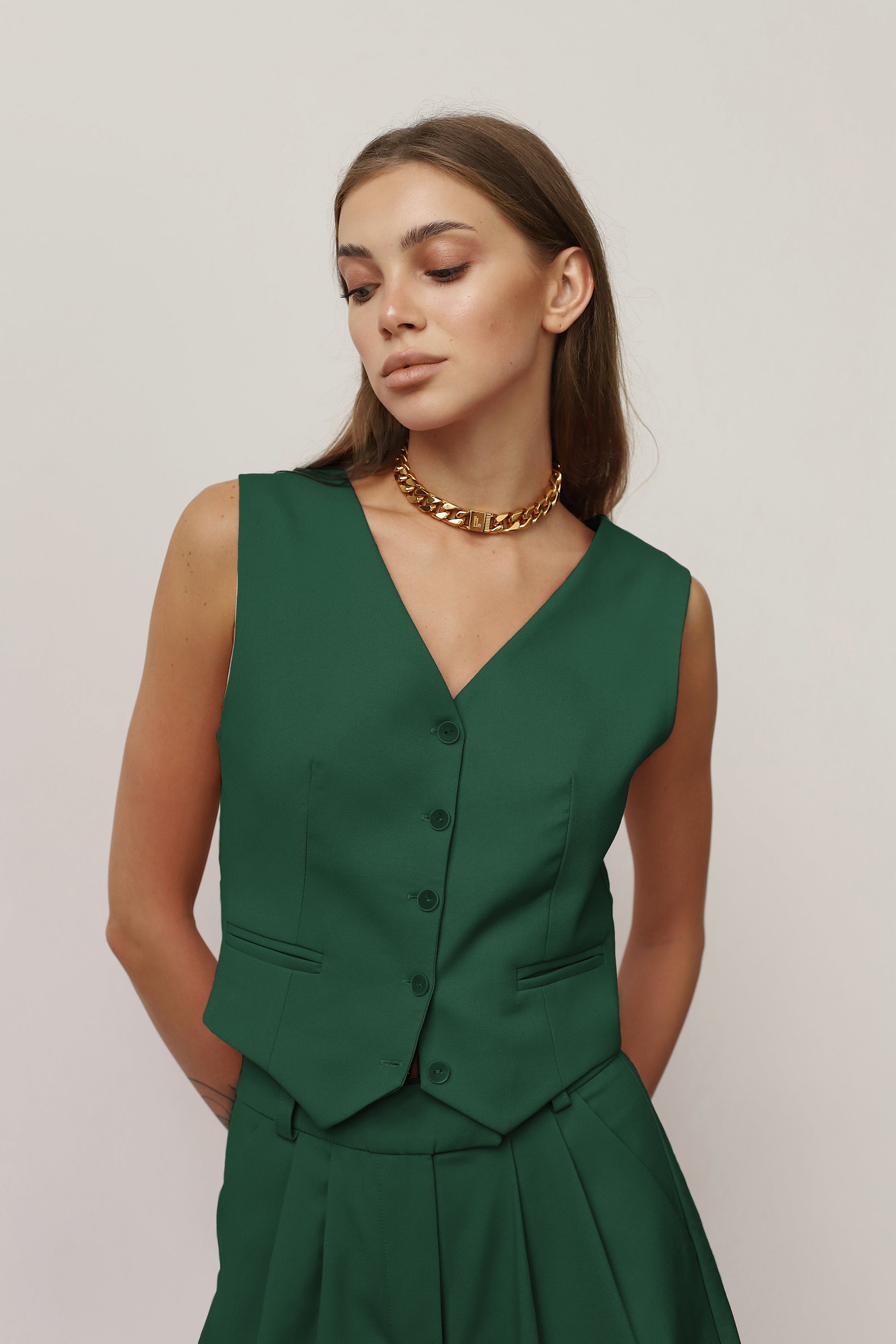 Dark green vest