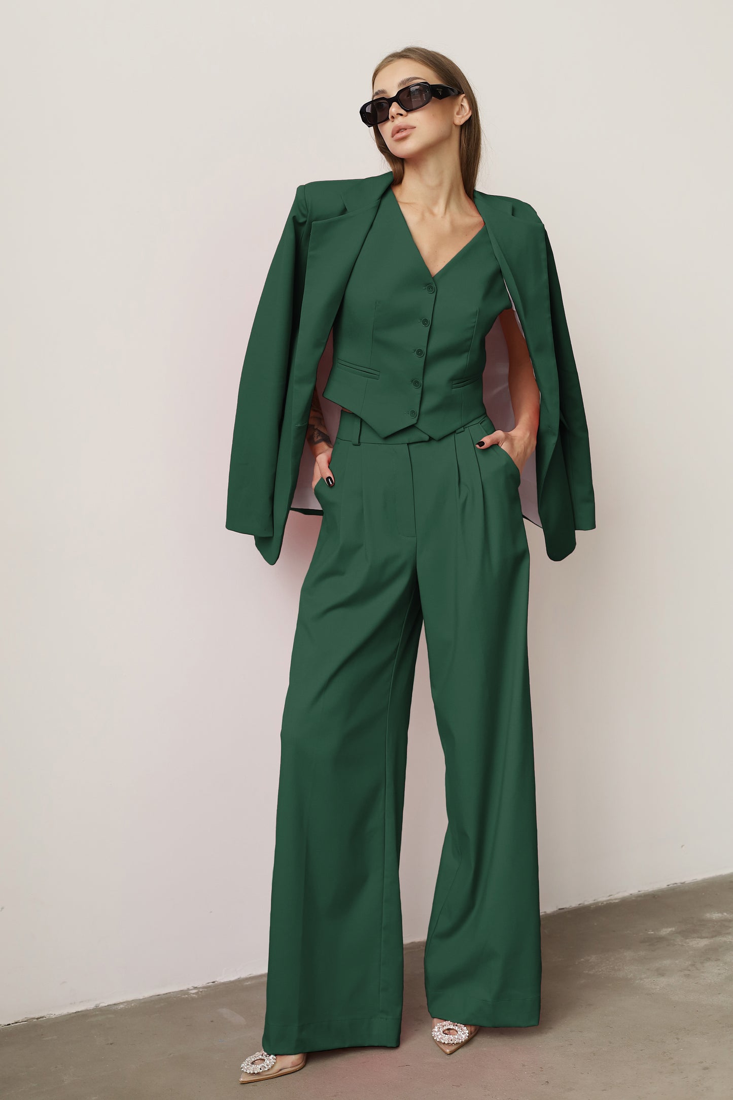 three piece dark green suit  