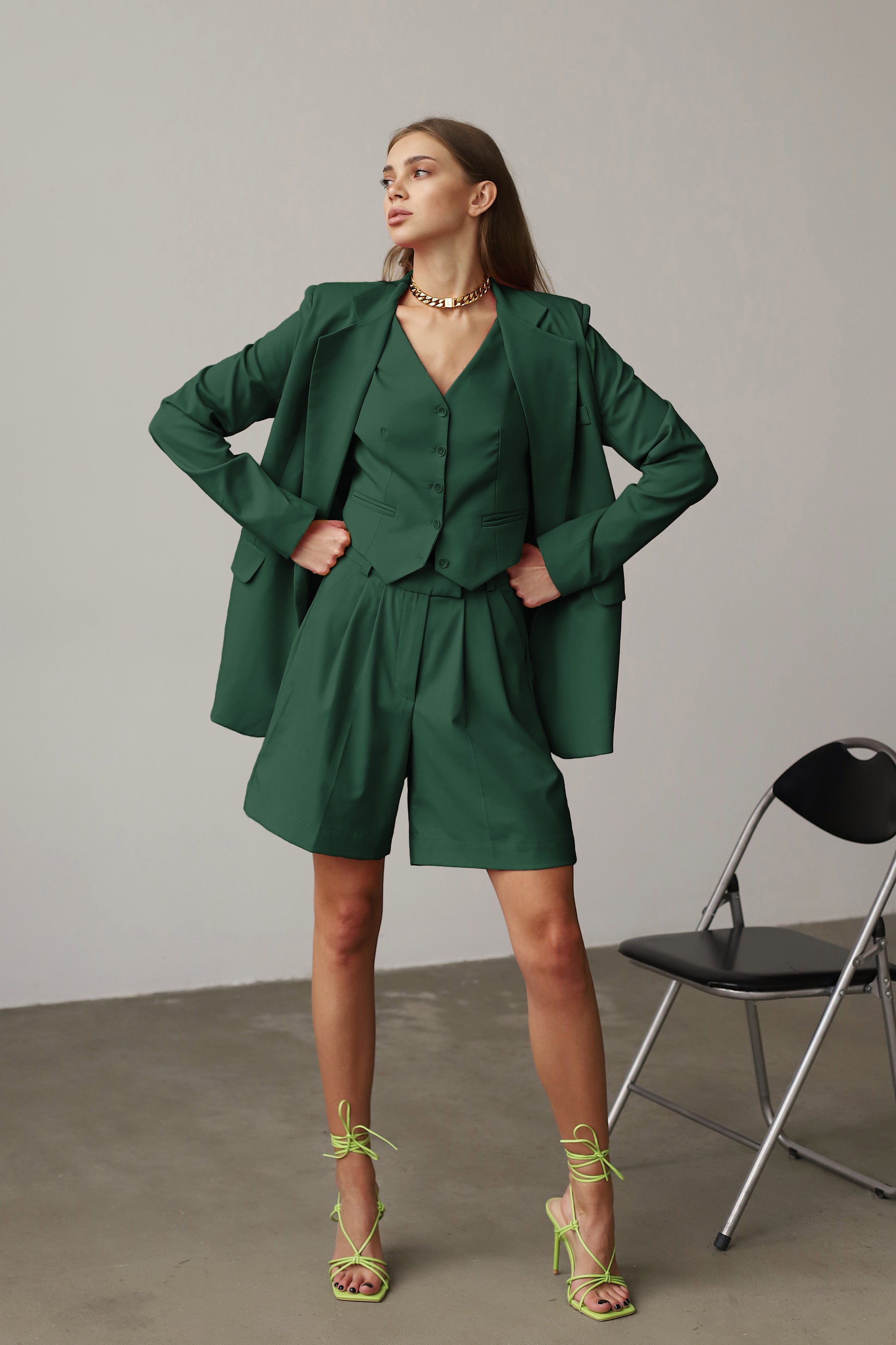 Green vest and shorts suit  