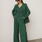 three piece dark green suit  