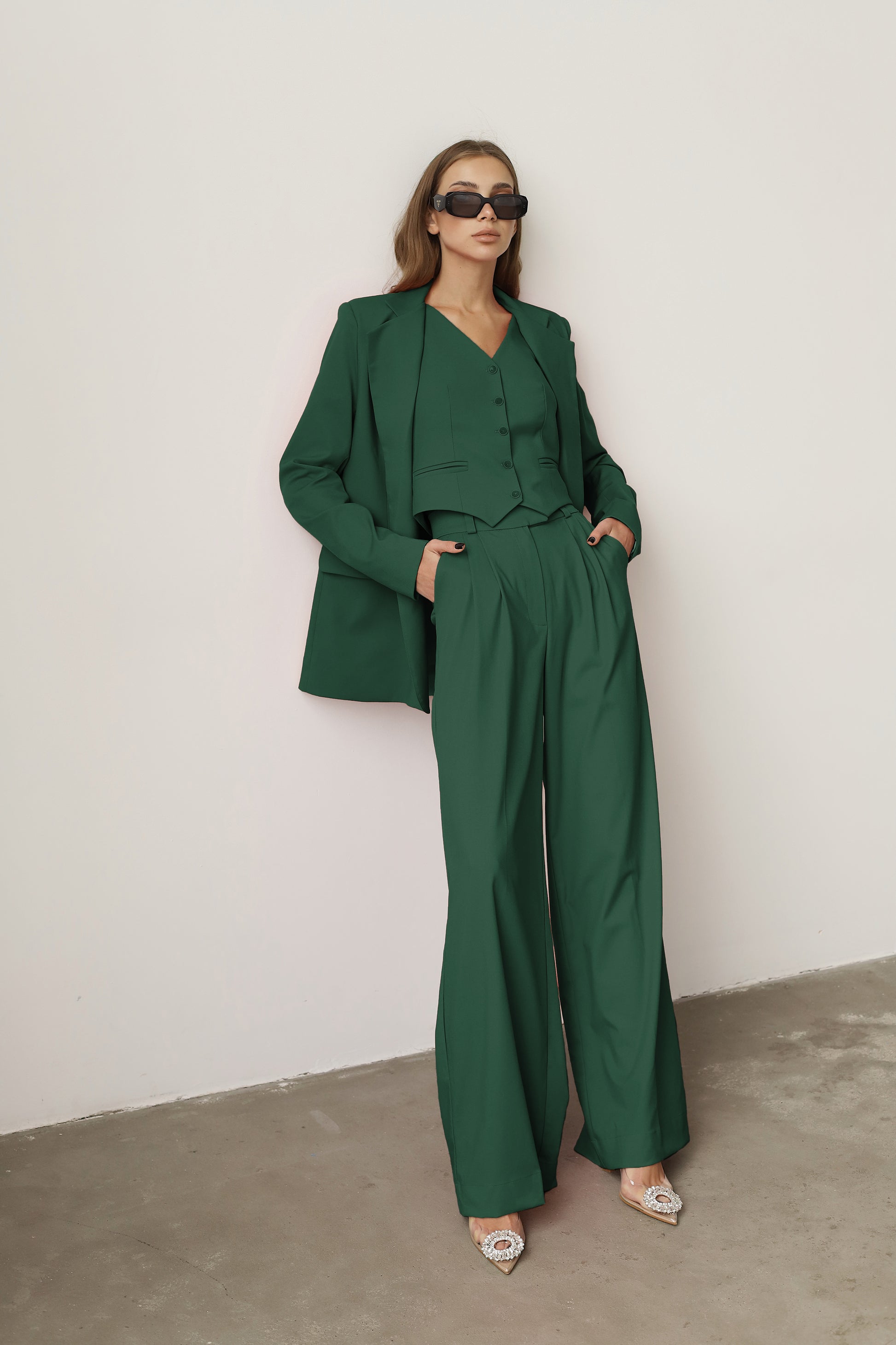 three piece dark green suit  