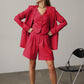 Red blazer and shorts suit  