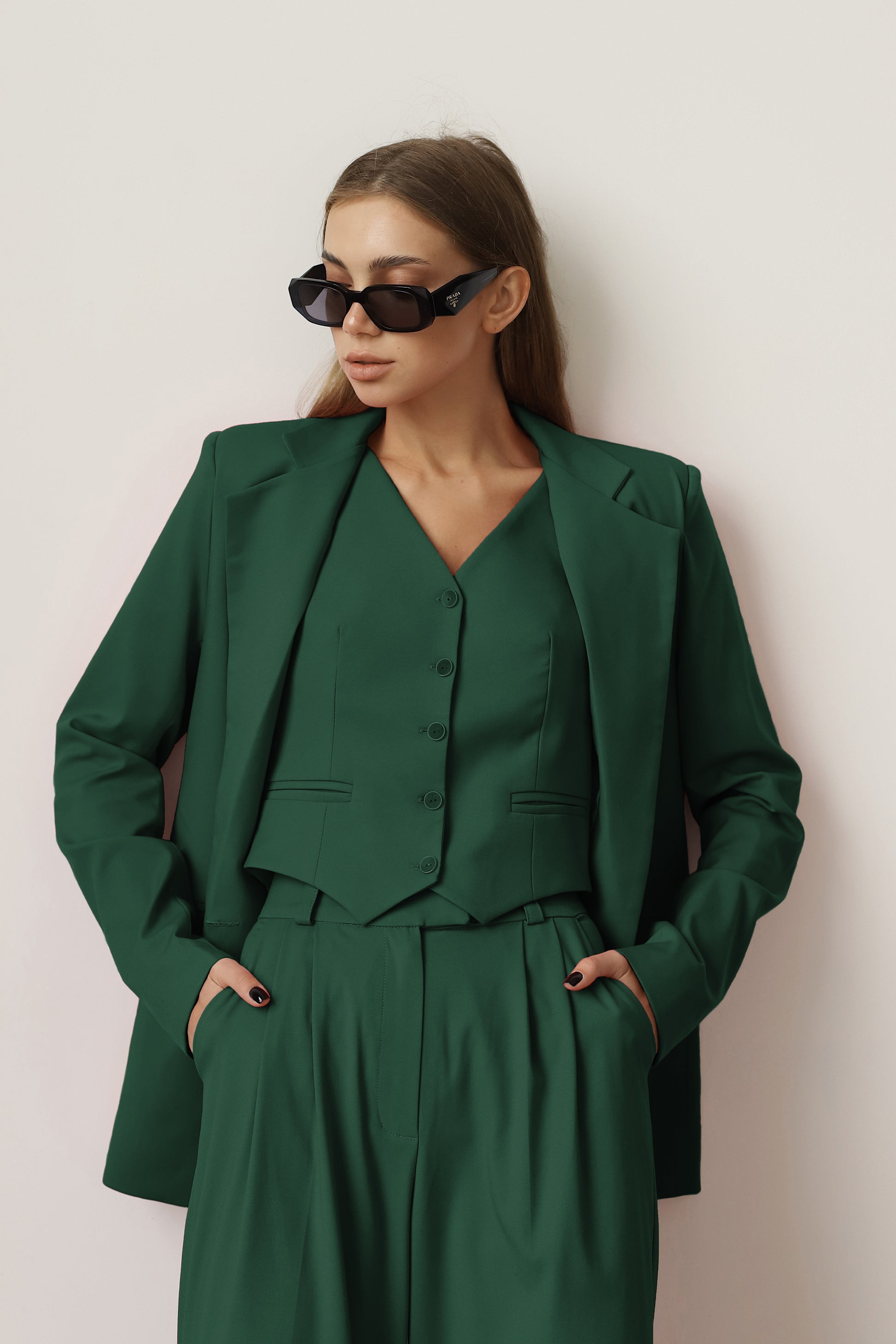 three piece dark green suit  